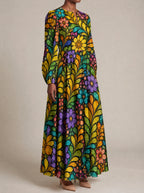 "Njano" Puff Sleeve Maxi Dress — three-quarter view on model