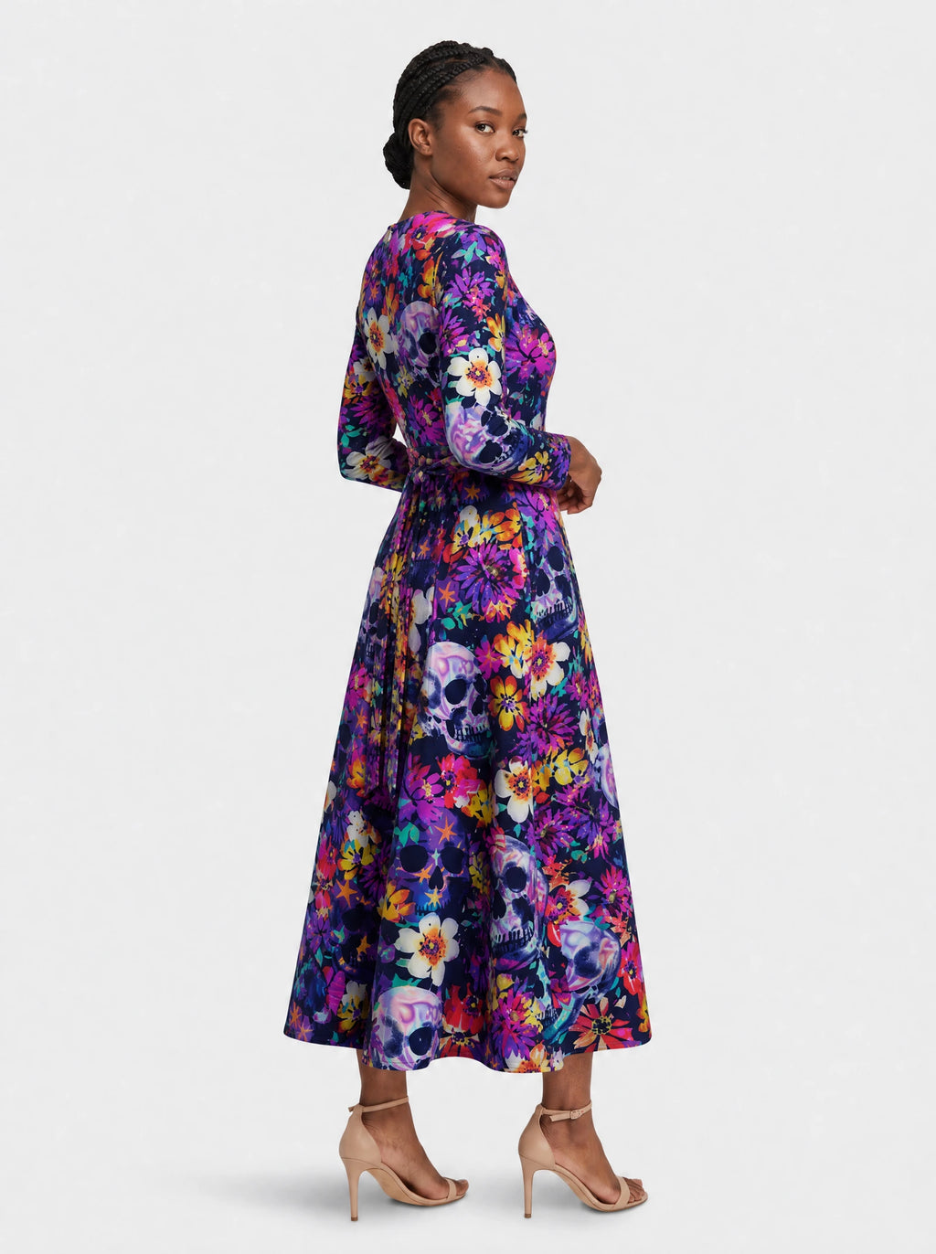 "Njozi" Long Sleeve Midaxi Dress — three-quarter view on model, hand in the side pocket