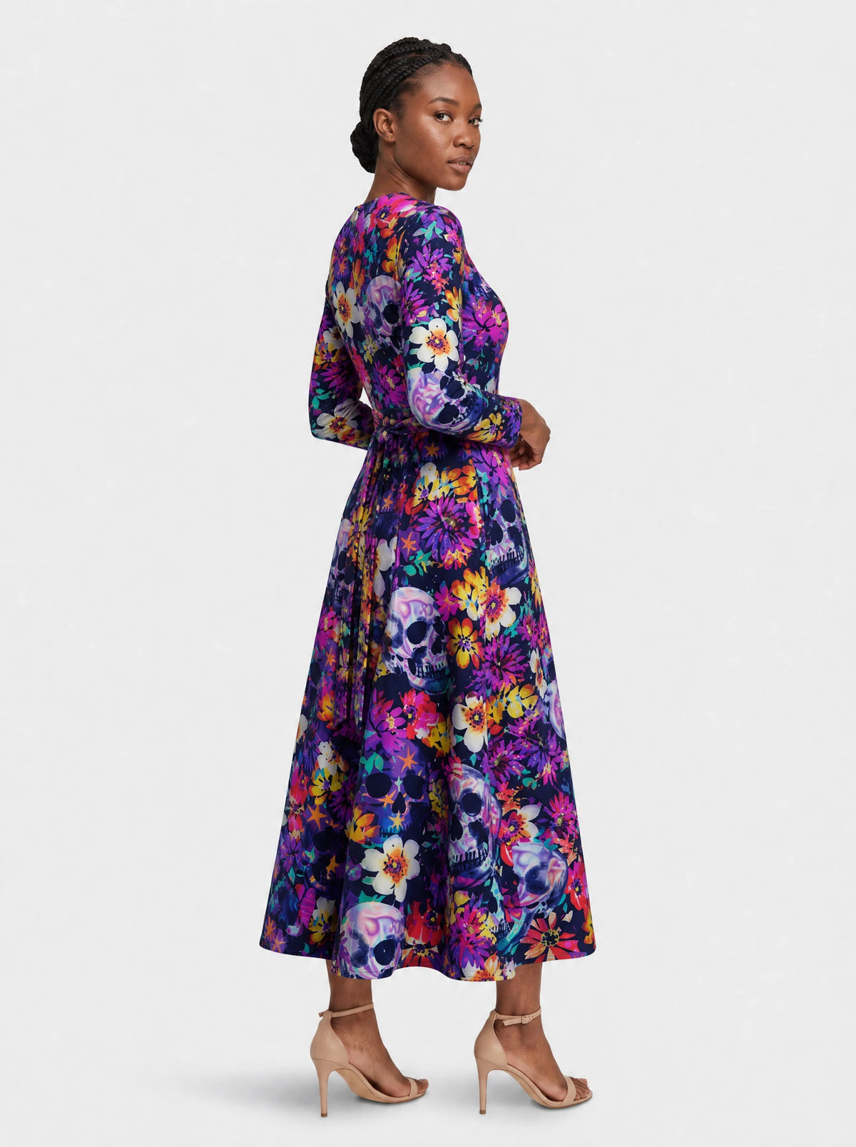 "Njozi" Long Sleeve Midaxi Dress — three-quarter view on model, hand in the side pocket
