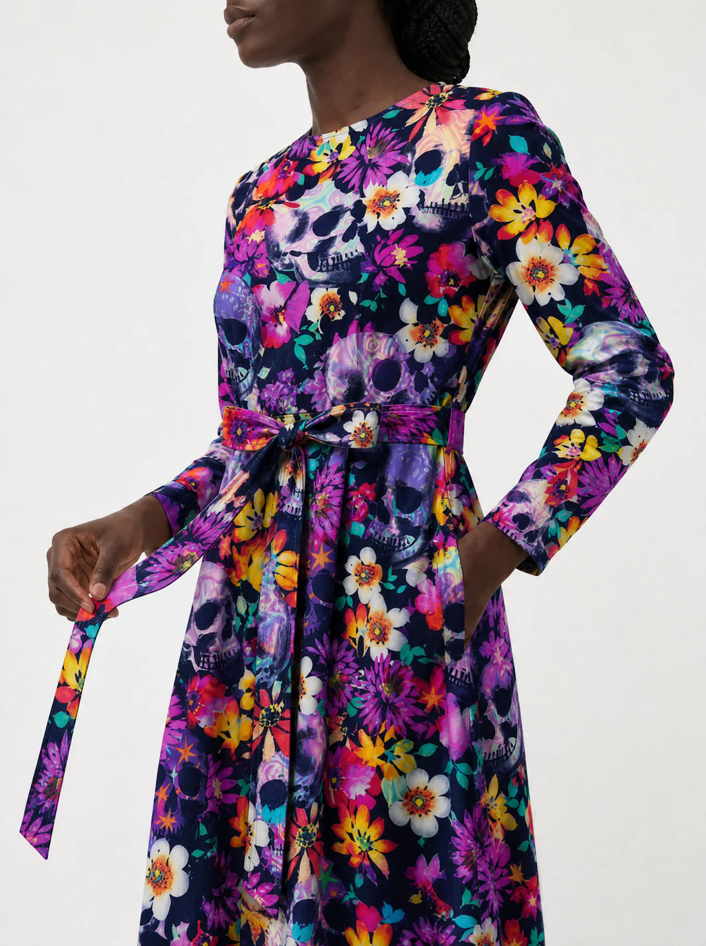 "Njozi" Long Sleeve Midaxi Dress — close-up of the tie sash and the in-seam side pocket
