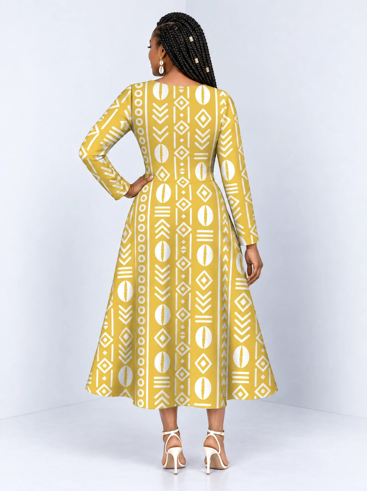 "Oshun Dhahabu" Long Sleeve Sweetheart Midi Dress — back view on model