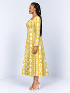 "Oshun Dhahabu" Long Sleeve Sweetheart Midi Dress — side view on model