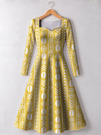 "Oshun Dhahabu" Long Sleeve Sweetheart Midi Dress — front view