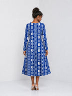 "Oshun Royal Blue" Long Sleeve Sweetheart Midi Dress — back view on model