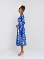 "Oshun Royal Blue" Long Sleeve Sweetheart Midi Dress — side view on model