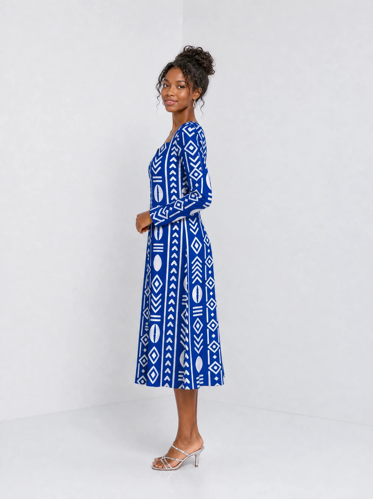 "Oshun Royal Blue" Long Sleeve Sweetheart Midi Dress — side view on model