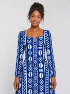 "Oshun Royal Blue" Long Sleeve Sweetheart Midi Dress — print close-up on model
