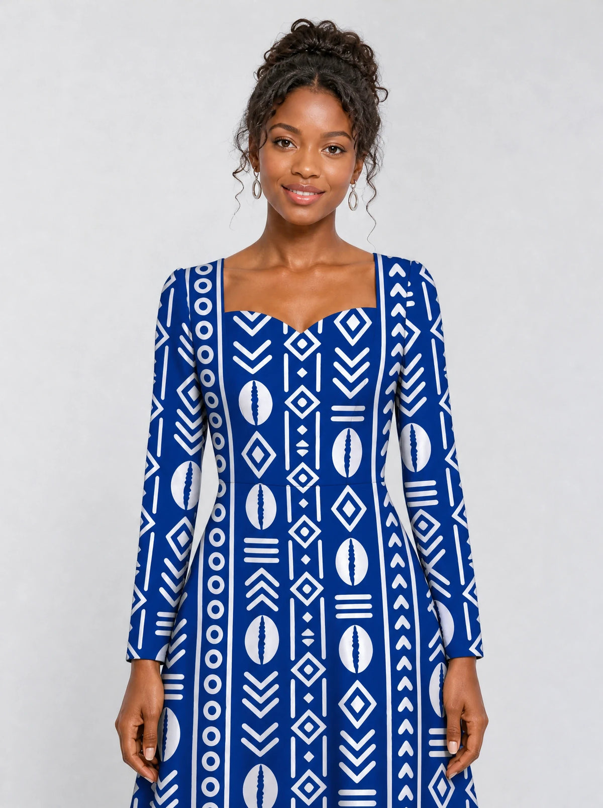 "Oshun Royal Blue" Long Sleeve Sweetheart Midi Dress — print close-up on model