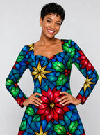 "Pendo" Long Sleeve Sweetheart Midi Dress — print close-up on model