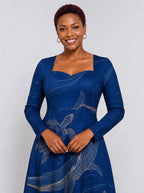 "Pwani" Long Sleeve Sweetheart Midi Dress — print close-up on model