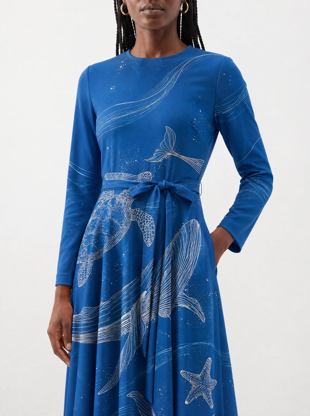 "Pwani" Long Sleeve Midaxi Dress — close-up of the tie sash and the in-seam side pocket