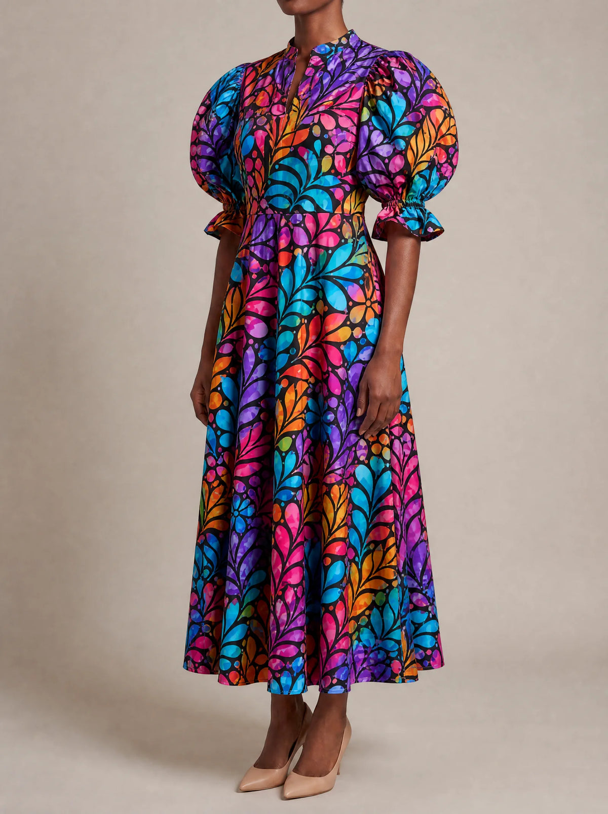 "Rangi" Puff Sleeve Dress — three-quarter view on model