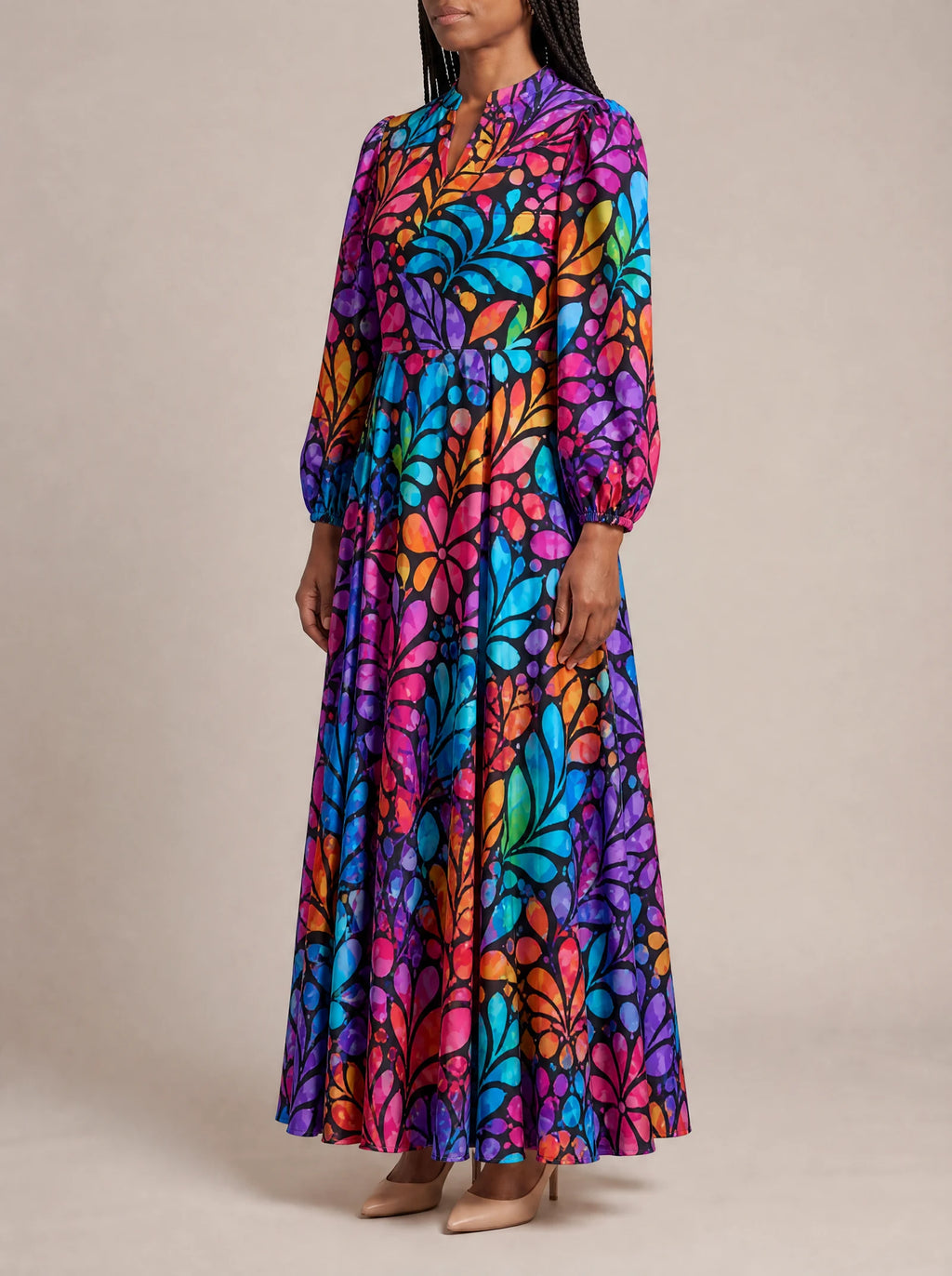 "Rangi" Puff Sleeve Maxi Dress — three-quarter view on model