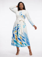 "Samaki" Long Sleeve Midaxi Dress — three-quarter view on model, hand in the side pocket