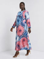 "Samawati" Long Sleeve Maxi Dress — three-quarter view on model