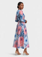 "Samawati" Long Sleeve Midaxi Dress — three-quarter view on model, hand in the side pocket