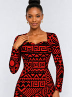 "Shaka Burgundy" Long Sleeve Sweetheart Midi Dress — print close-up on model