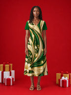 "Shanga" V Neck Midi Dress — on model, Christmas backdrop