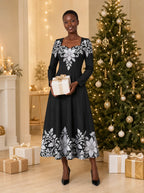"Shwari" Long Sleeve Sweetheart Midi Dress — on model, Christmas backdrop