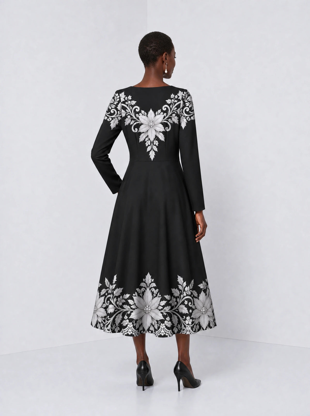 "Shwari" Long Sleeve Sweetheart Midi Dress — back view on model