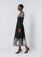 "Shwari" Long Sleeve Sweetheart Midi Dress — side view on model