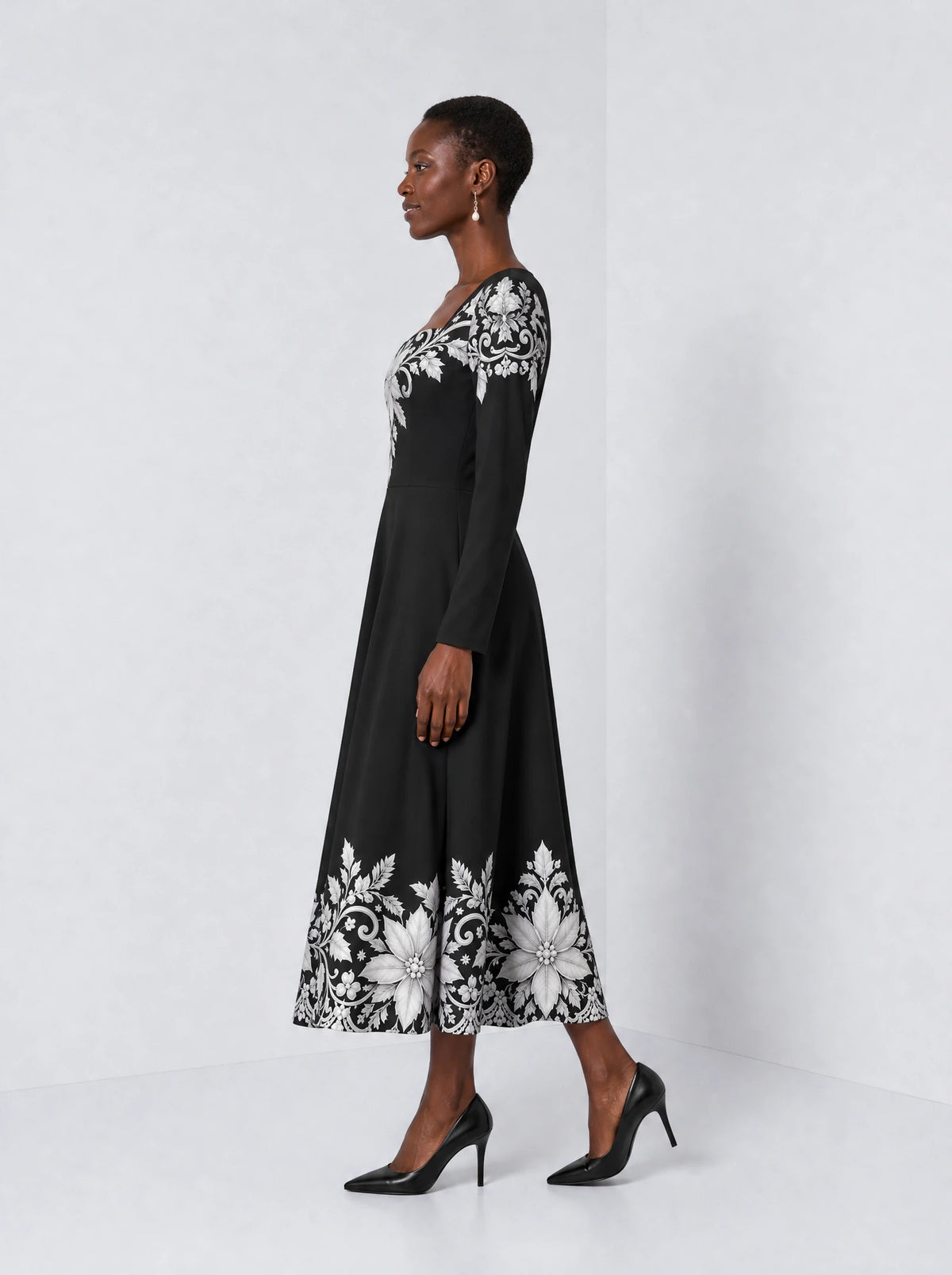 "Shwari" Long Sleeve Sweetheart Midi Dress — side view on model