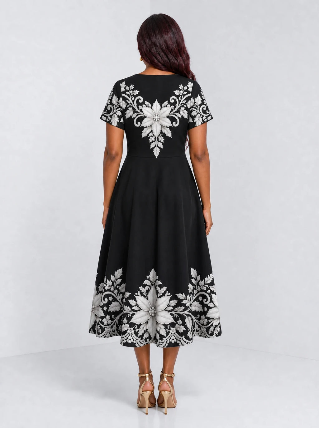 "Shwari" Sweetheart Midi Dress — back view on model