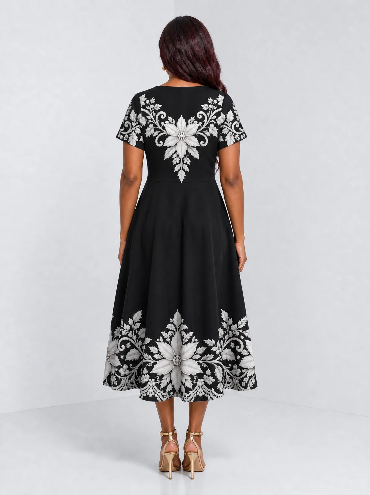 "Shwari" Sweetheart Midi Dress — back view on model