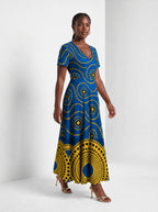 "Sitara" Short Sleeve Maxi Dress — walking, three-quarter view on model