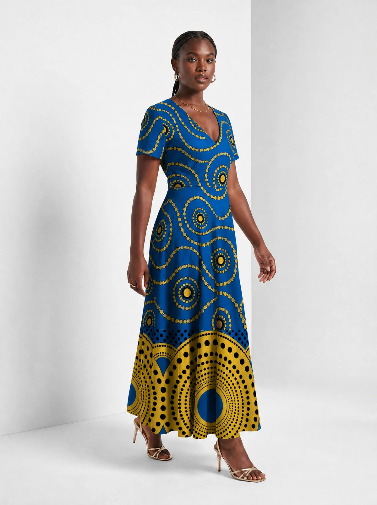 "Sitara" Short Sleeve Maxi Dress — walking, three-quarter view on model