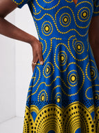 "Sitara" Short Sleeve Maxi Dress — standing, angled view on model