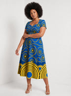 "Sitara" Sweetheart Midi Dress — walking, three-quarter view on model
