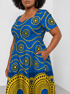 "Sitara" Sweetheart Midi Dress — standing, angled view on model