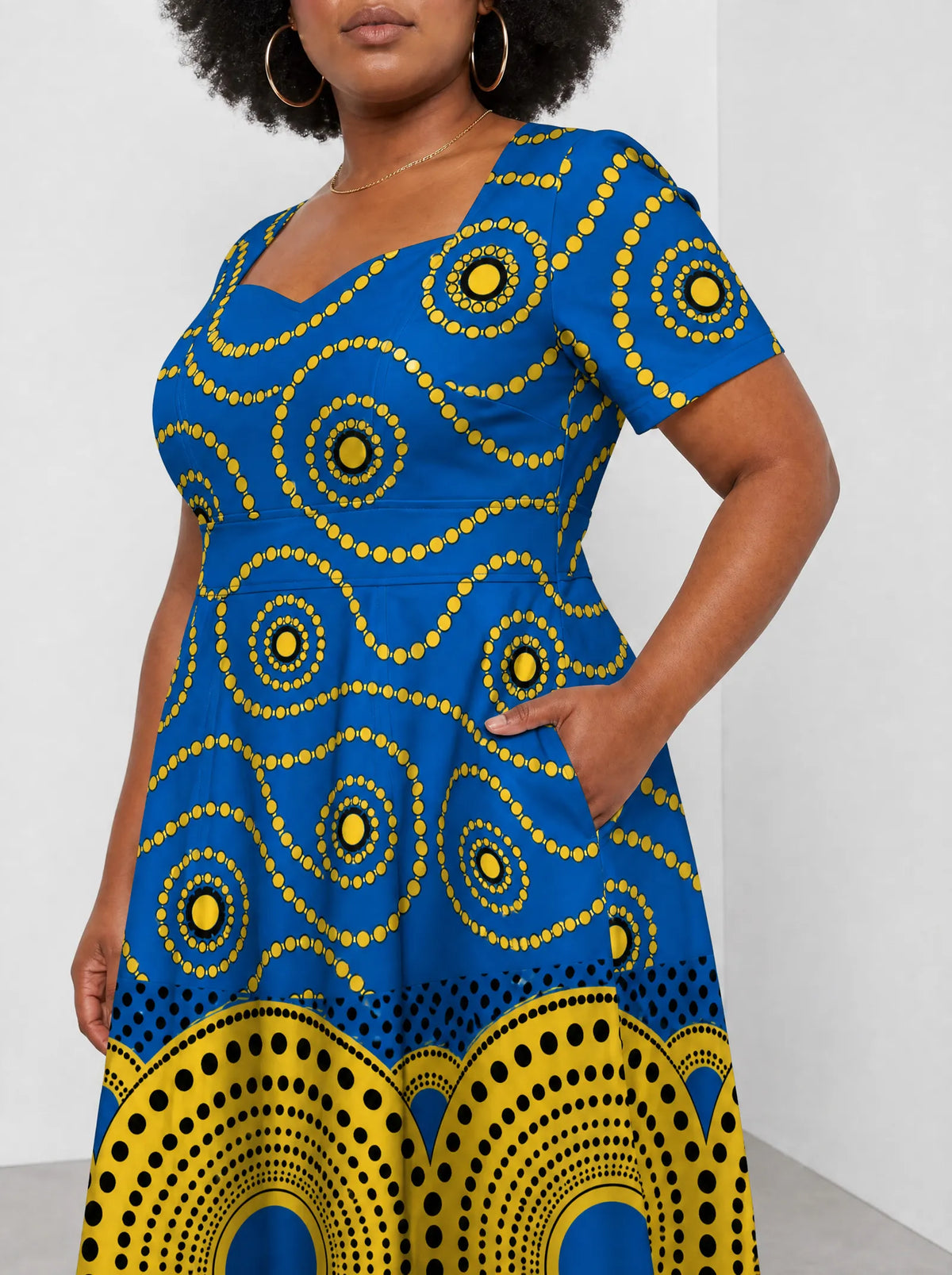 "Sitara" Sweetheart Midi Dress — standing, angled view on model
