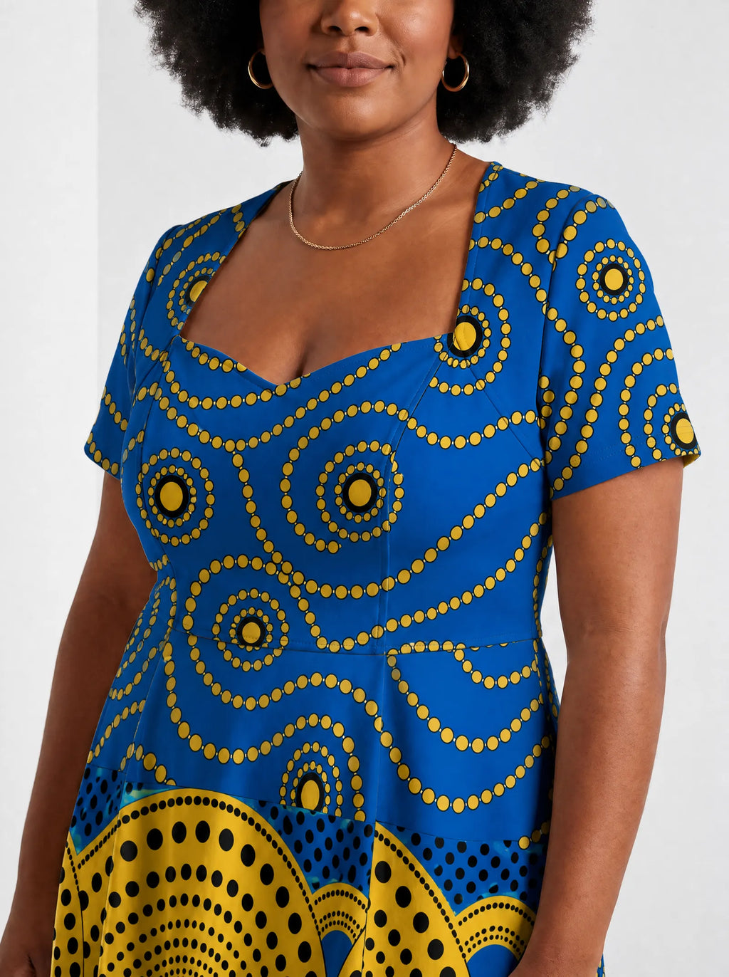"Sitara" Sweetheart Midi Dress — three-quarter view on model