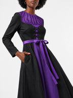 "Sorceress" Long Sleeve Midaxi Dress — standing, angled view on model