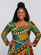 "Taji" Long Sleeve Sweetheart Midi Dress — print close-up on model