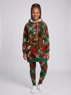 "Tamasha" Christmas Leggings — full length on model, styled with the matching hoodie dress
