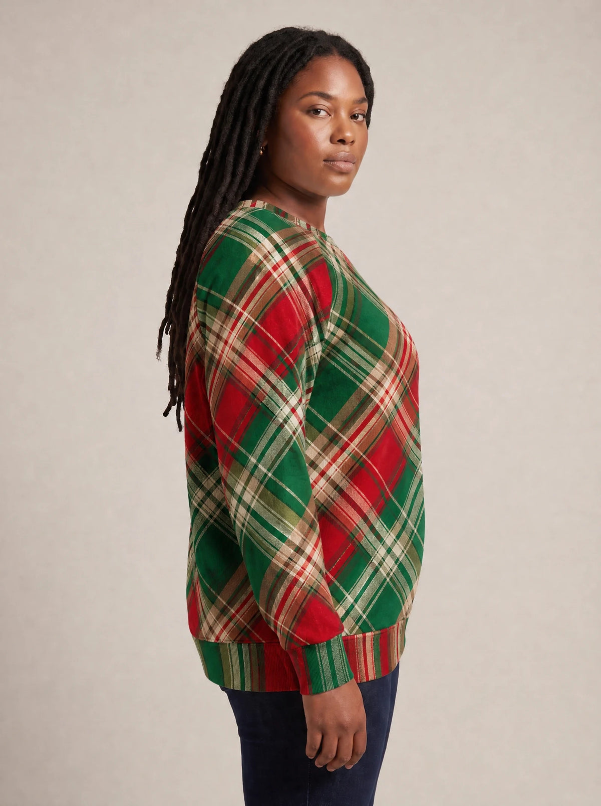 "Tamasha" Christmas Sweatshirt — side view on model