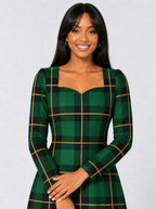 "Tandiko" Long Sleeve Sweetheart Midi Dress — print close-up on model