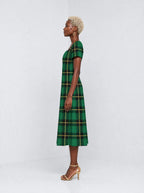 "Tandiko" Sweetheart Midi Dress — side view on model