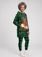 "Theluji" Christmas Hoodie Dress — three-quarter view on model, hand in pocket, styled with the matching leggings