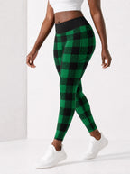 "Theluji" Christmas Leggings — side view on model, walking