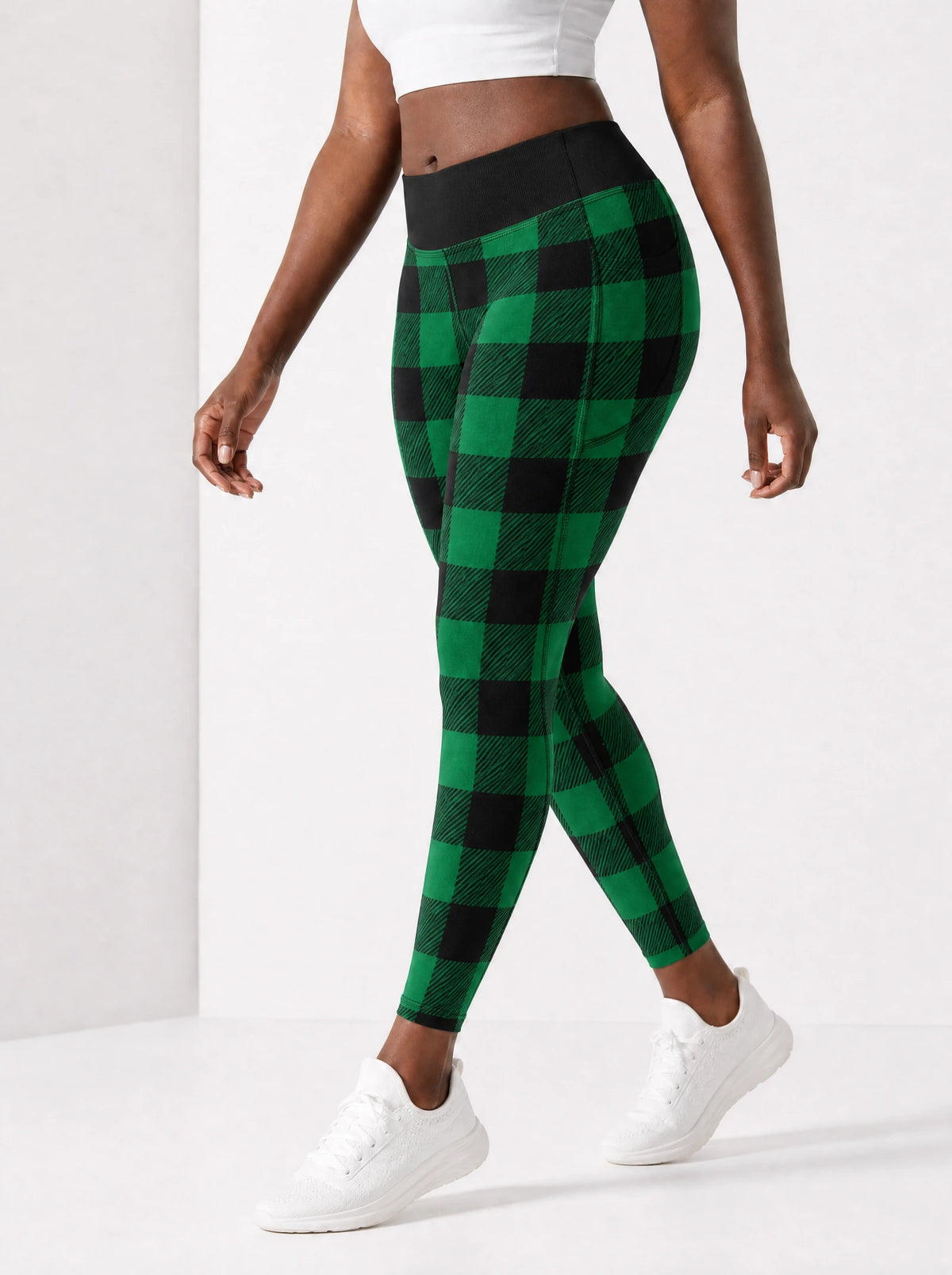 "Theluji" Christmas Leggings — side view on model, walking