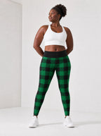 "Theluji" Christmas Leggings — full length on model
