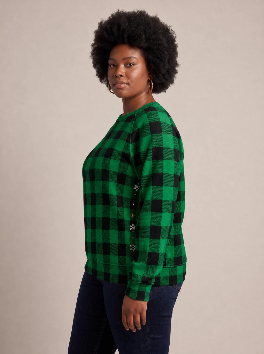 "Theluji" Christmas Sweatshirt — side view on model