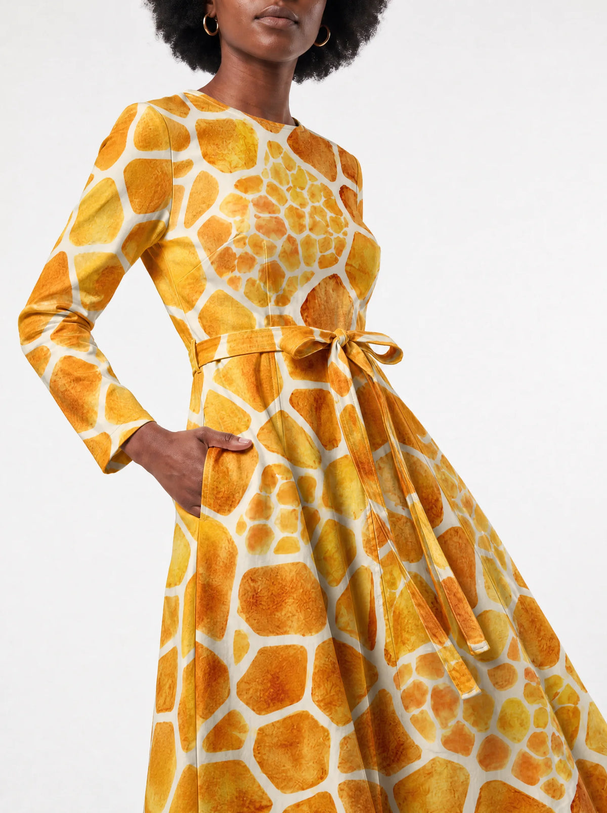 "Twiga" Long Sleeve Midaxi Dress — close-up of the tie sash and the in-seam side pocket