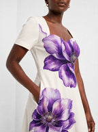 "Ua" Sweetheart Midi Dress — standing, angled view on model