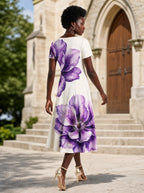 "Ua" Sweetheart Midi Dress — back view on model in the churchyard
