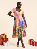"Uchoraji" Sweetheart Midi Dress — on model, Christmas backdrop